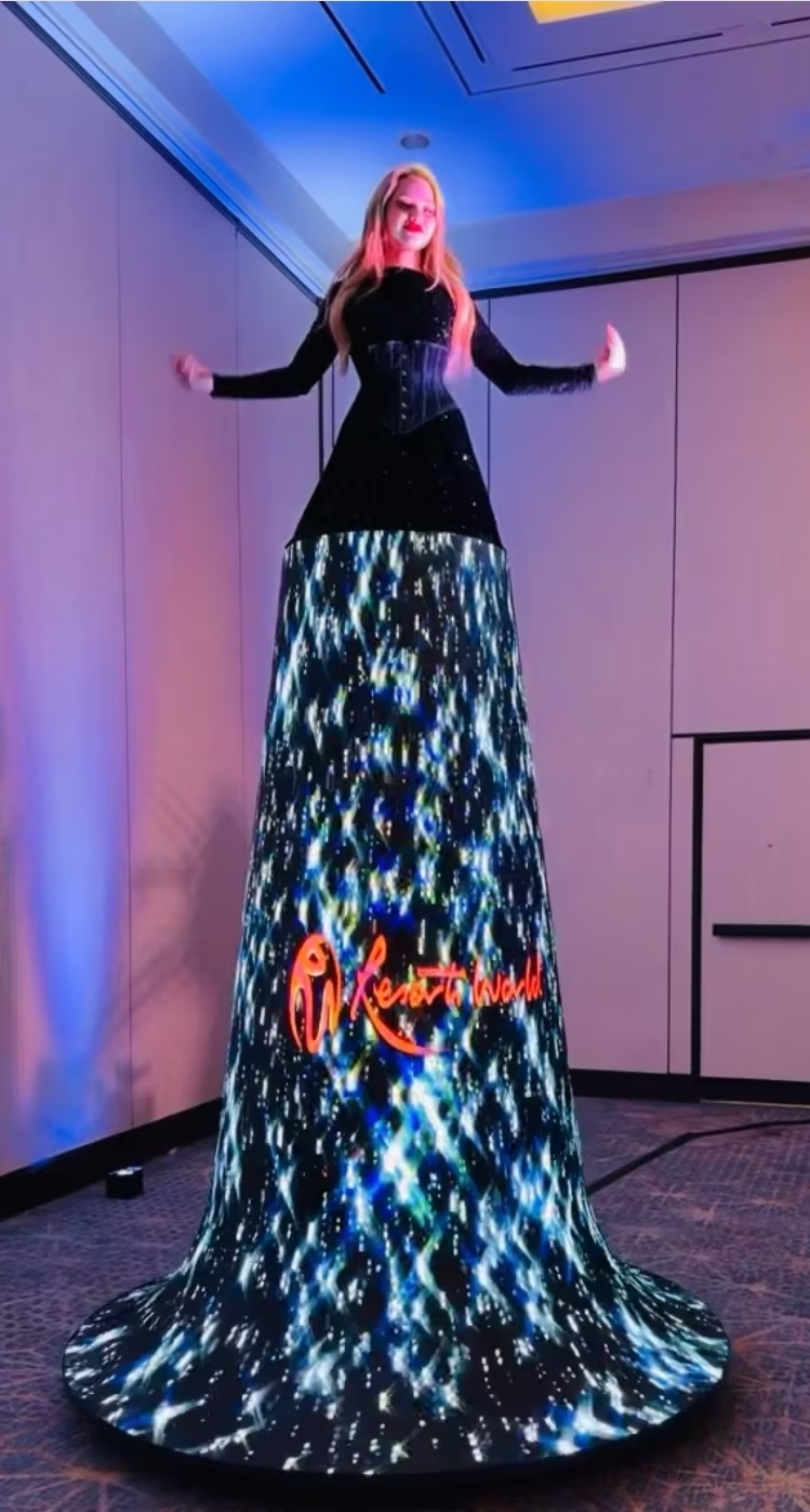The LED Queen — 12ft LED Video Wall Dress with live performer, Las Vegas