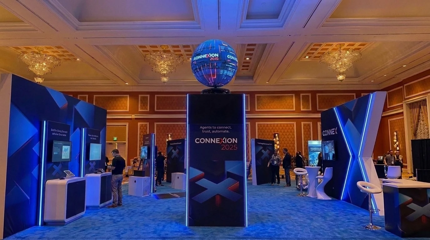 Immersive exhibit with illuminated architectural features and an LED sphere